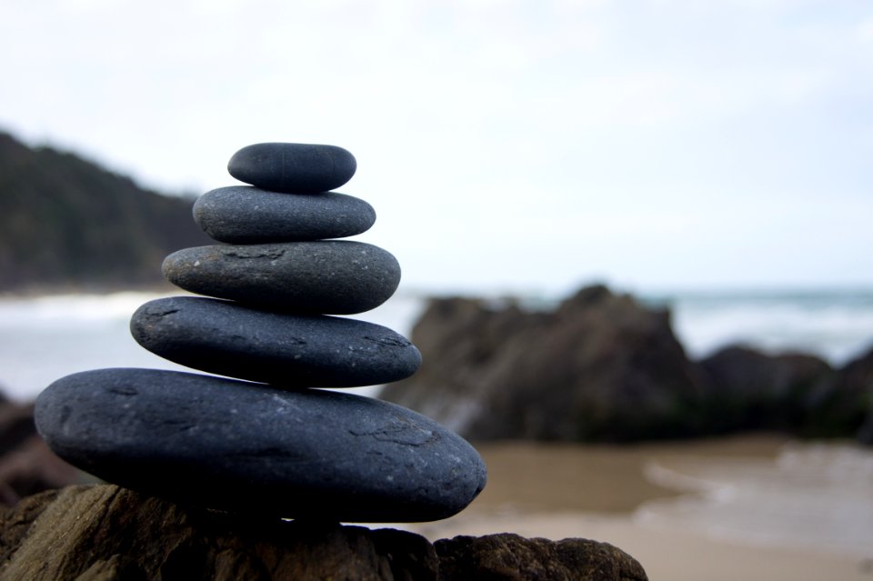 Photo Of Stacked Rocks Near Shore