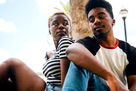 Man Sitting Beside Woman
