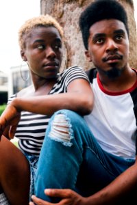 Man Sitting Beside Woman