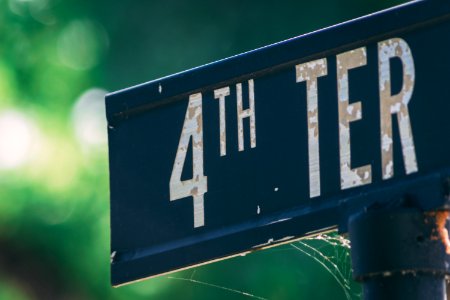 Blue And White Metal 4th Ter Signage