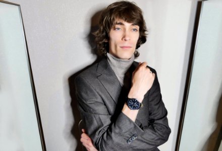 Portrait Of Man Wearing Gray Suit Jacket Posing