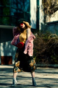Woman Standing Wearing Pink Coat