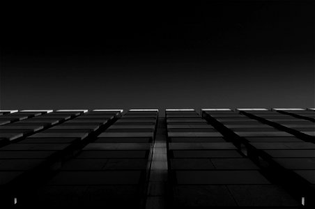 Grayscale Photo Of High Rise Building photo