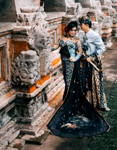Photography Of Woman In Black And Blue Lace Dress Beside Man