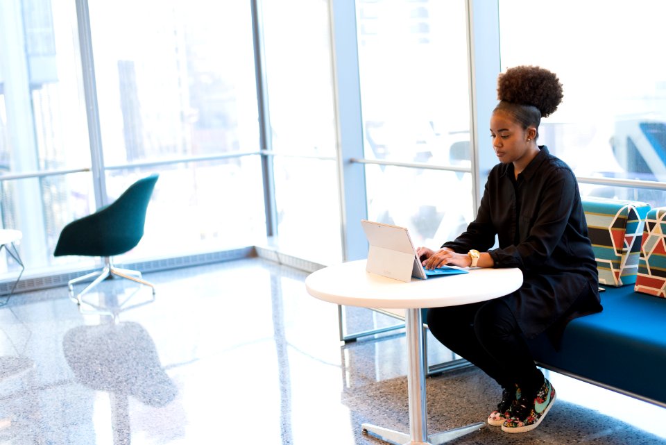 Woman Using Laptop Computer