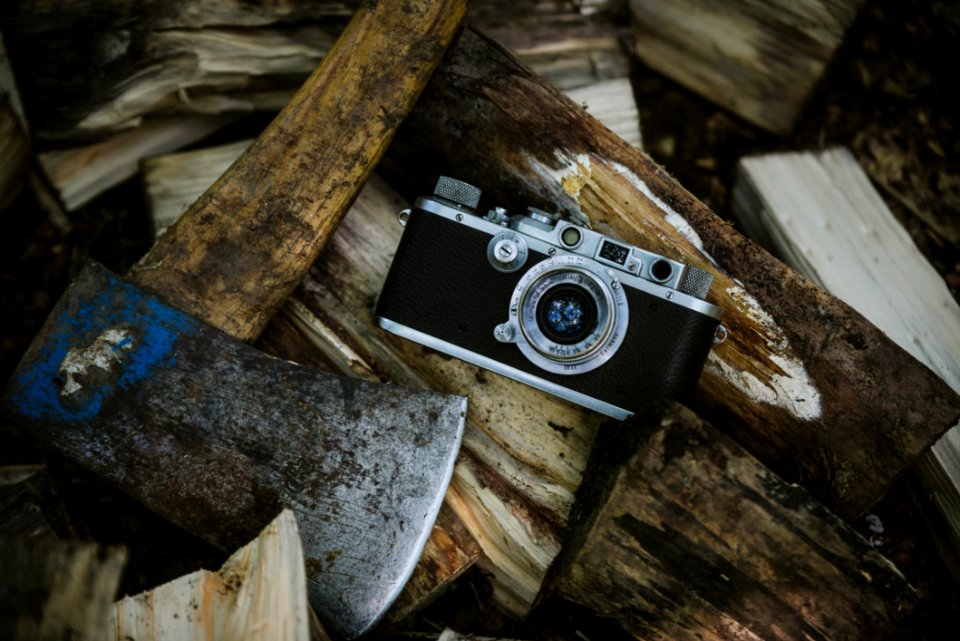 Black And Grey Camera Near Ax photo