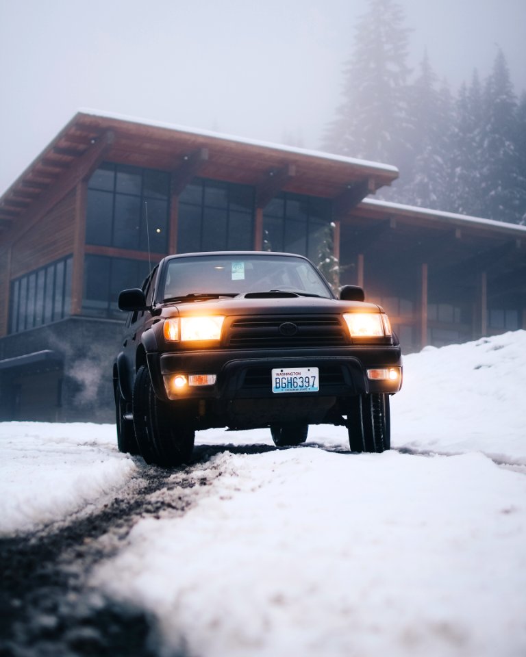 Black Toyota Vehicle On Snow Field At Daytime