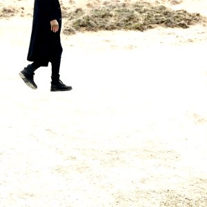 Person In Black Coat photo