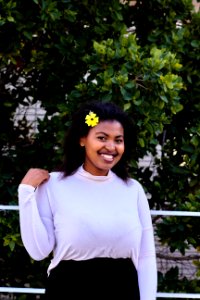 Smiling Woman Wearing White Long-sleeved Blouse