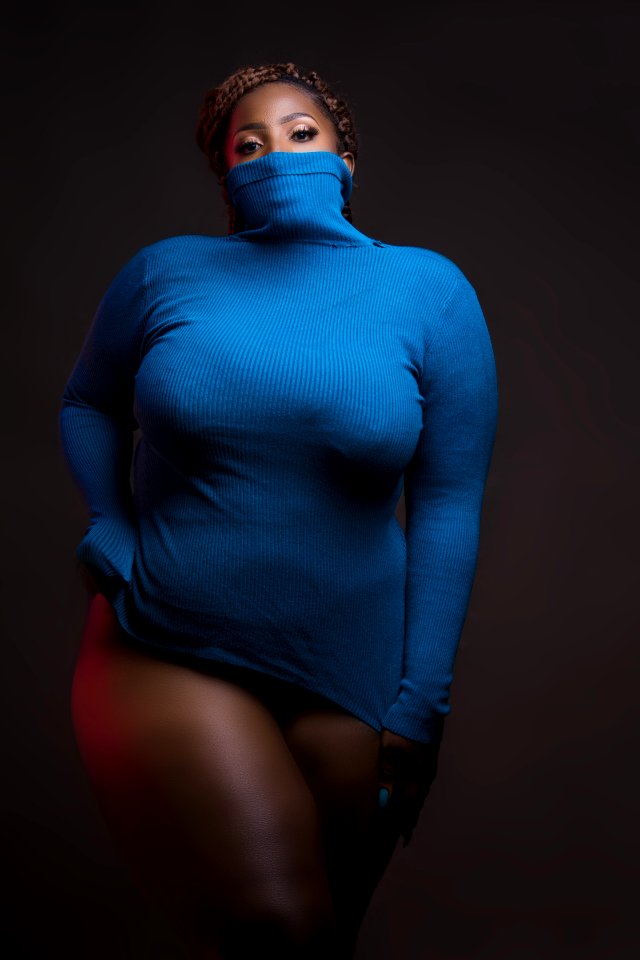 Woman In Blue Turtleneck Sweatshirt