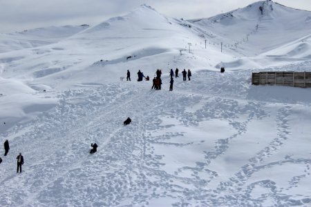 Person Walking On Snowfield photo
