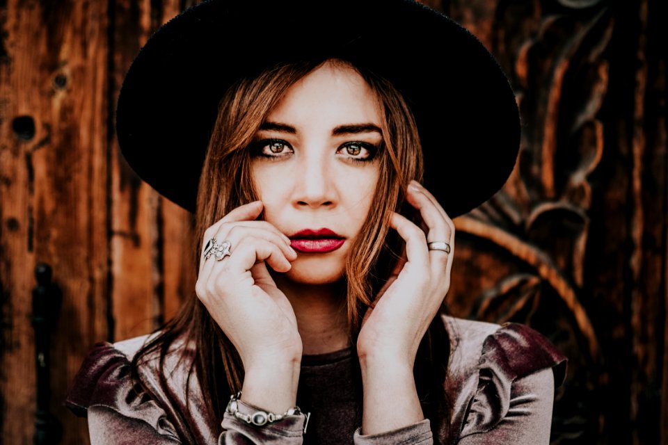 Woman Wearing Black Hat