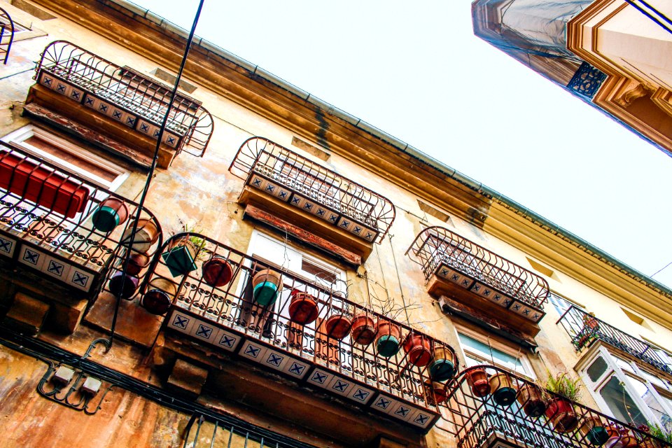 Plant Pots On Metal Balcony photo