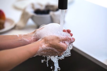 Person Washing His Hand