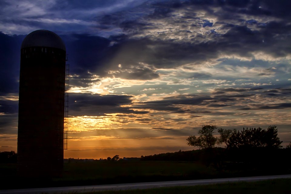 Silhouette Of Silo During Sundown