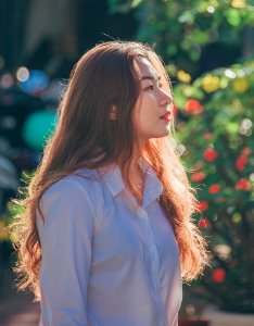 Woman In White Collared Button-up Long-sleeved Shirt