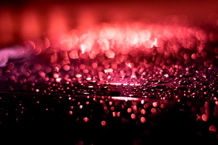 Close-up Photography Of Red Water Droplets