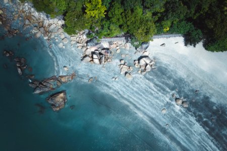 Aerial Photography Of Stones On Seashore photo