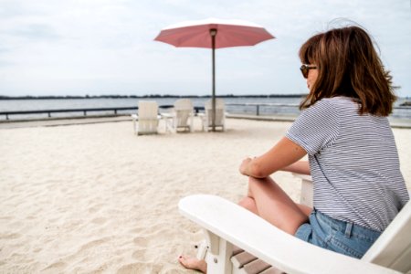 Woman Sitting On Beach Chair photo