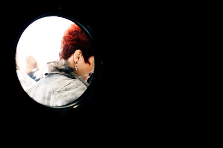 Person With Red Hair Wearing Gray Parka
