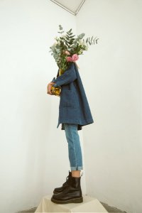 Gray Coat And Blue Jeans