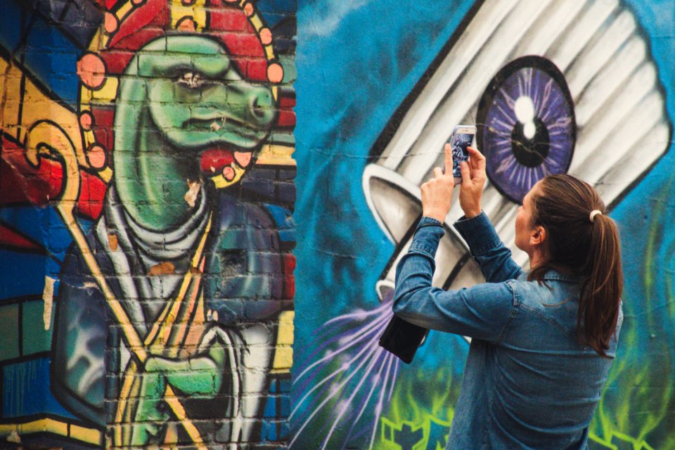 Photo Of A Woman Taking Picture