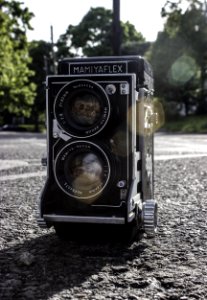 Shallow Focus Of Black Road Camera