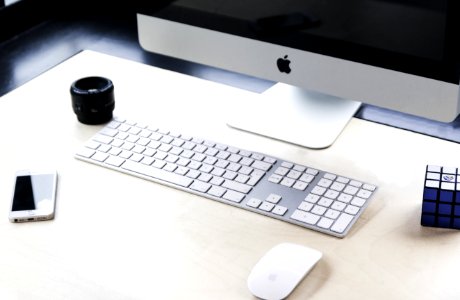 Imac Beside Apple Wireless Keyboard And Magic Mouse photo