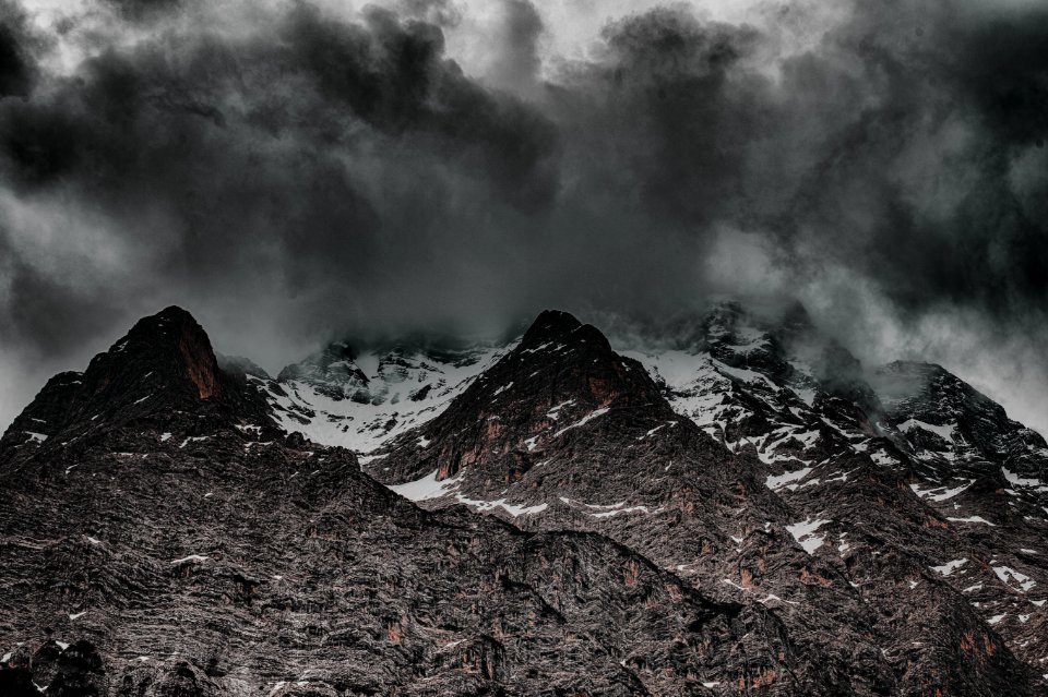 Grayscale Photo Of Mountain Hill