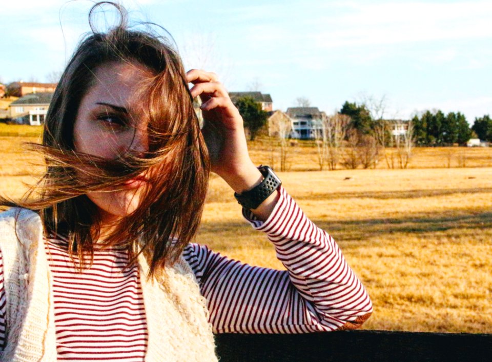 Woman About To Hold Her Hair During Daytiome
