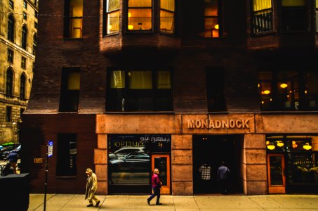 Two People Near Building