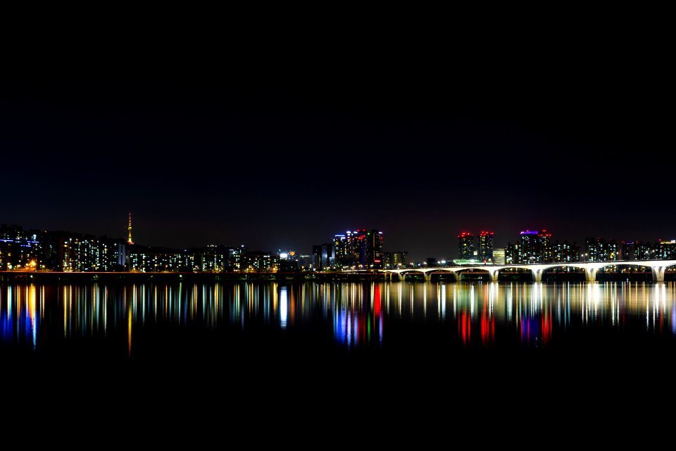 City Near Bodies Of Water During Night Time