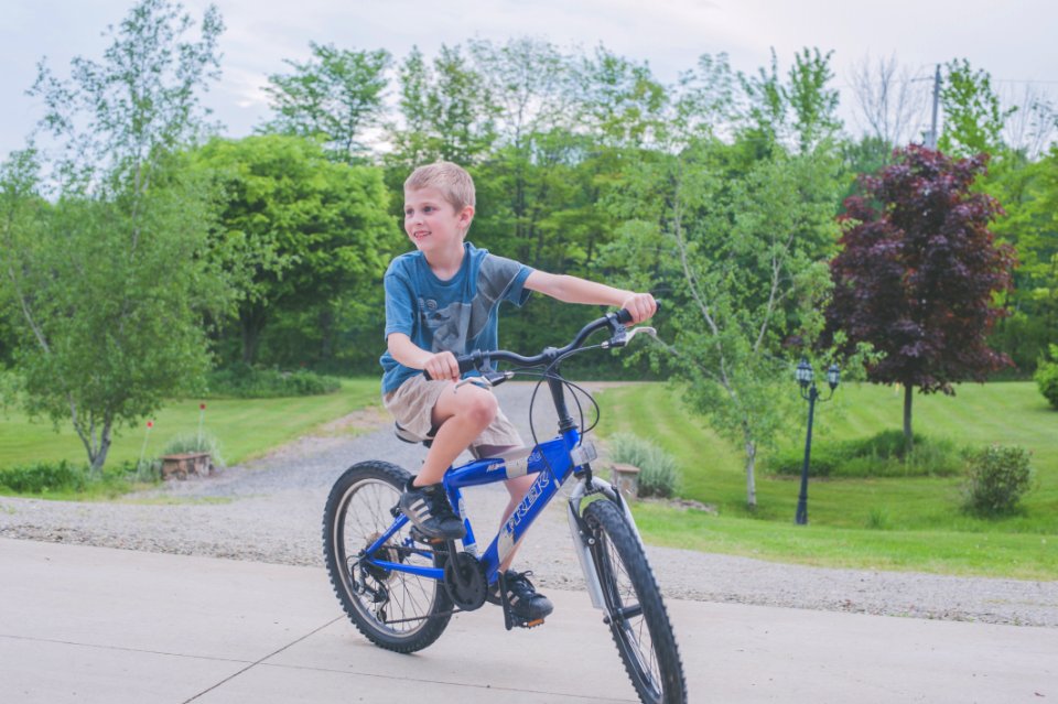 Boy Riding Bicycle