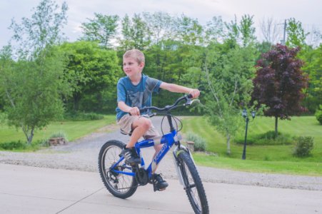 Boy Riding Bicycle photo