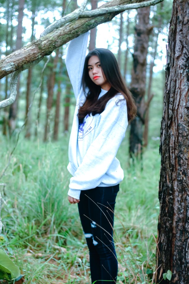Woman Wearing White Sweatshirt