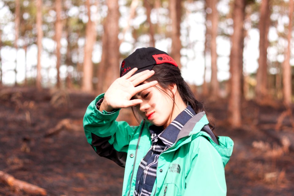 Woman Wearing Green And Grey Jacket