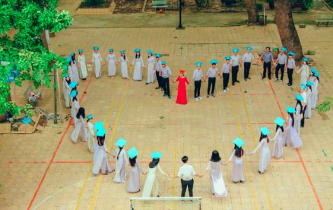 Photography Of Group Of People Form Heart-shape photo