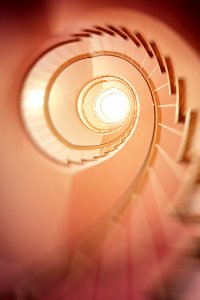 Low Angle Photography Of Spiral Stair photo