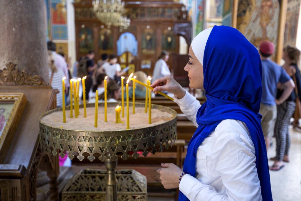 Woman Holding Candle