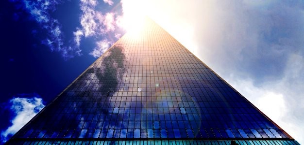 Low Angle Photograph Of Pyramid Glass During Calm Weather photo