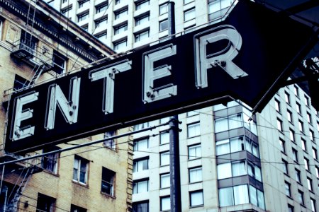 Turned Off Black And White Enter Signage