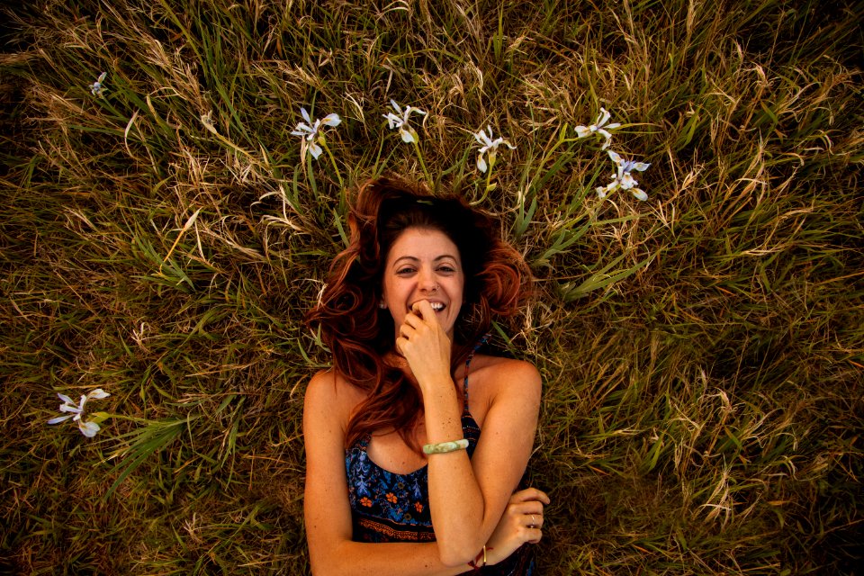 Woman Wearing Blue And Multicolored Floral Cami Top