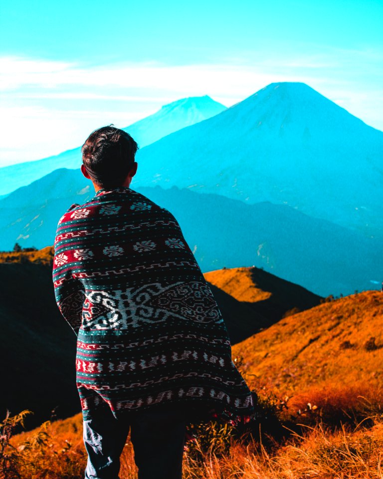 Person Staring At The Mountain