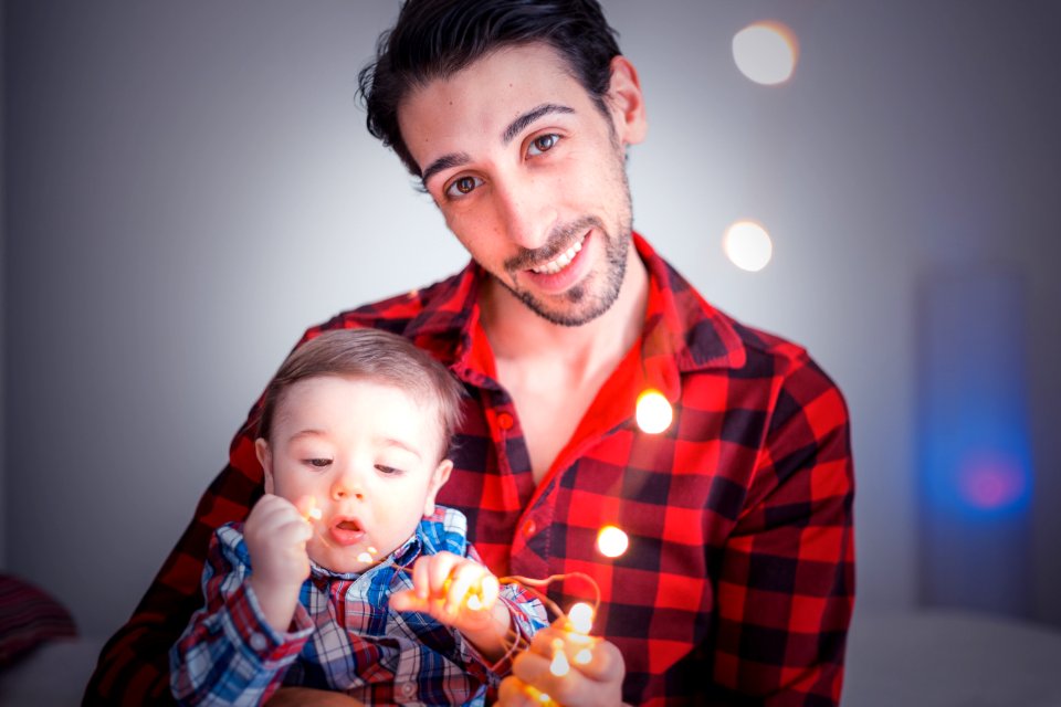 Man Carrying Toddler