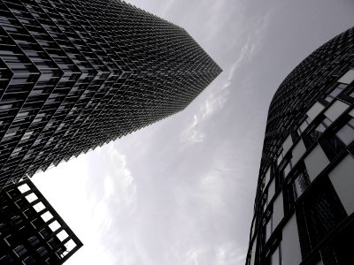 Low Angle Grayscale Photogray Of High Rise Buildings photo