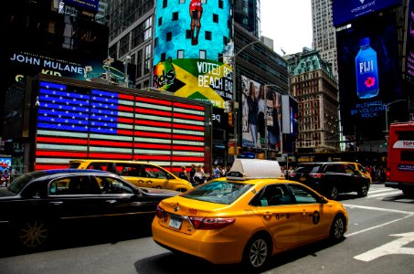 Yellow Taxi In Time Square New York photo