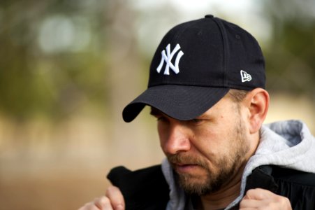 Man Wearing New York Yankees Cap photo