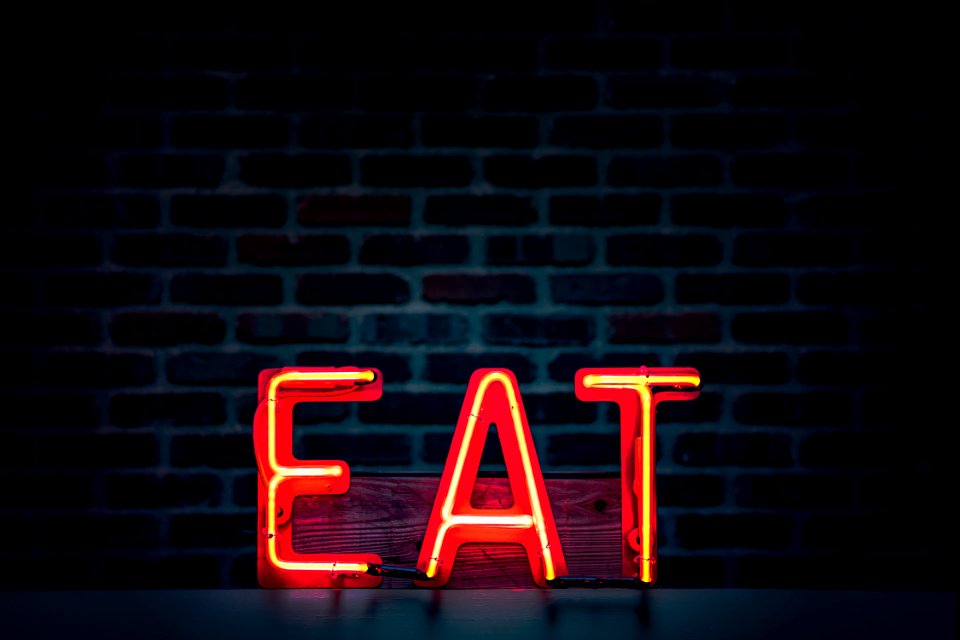 Red Eat Neon Sign Turned On