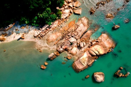 Aerial Photography Of Brown Rocky Shoreline photo