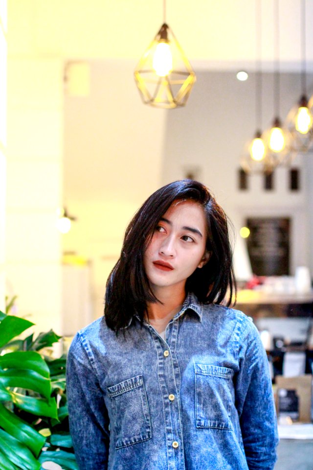 Woman In Blue Denim Button-up Jacket